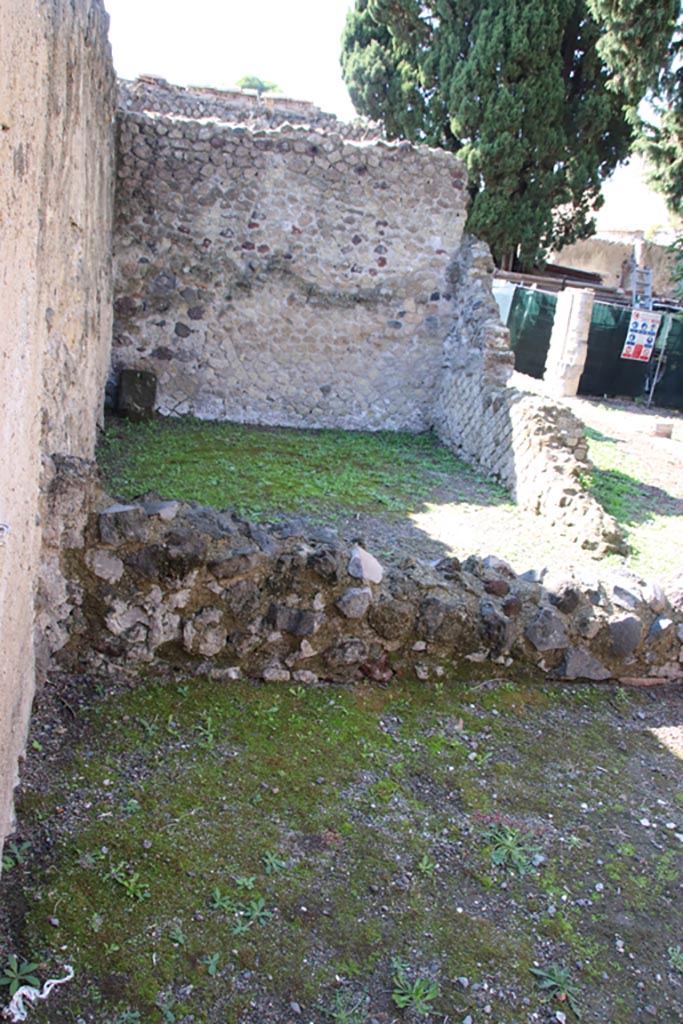 II.4 Herculaneum, October 2022. Lower, remains of room on south side of shop.
The upper part of the photo is a room in II.3. Photo courtesy of Klaus Heese.